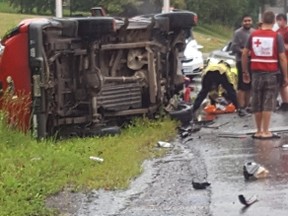 4 people were taken to hospital Saturday, July 25, 2015 following this crash at the corner of Prince of Wales and Jockvale near Manotick. A truck flipped over and a BMW was damage according to witnesses.
Submitted photo.