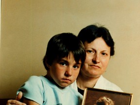 Jeremy Mead, then 7, with his grandmother Eva Gulyas, holds a photo of his mother Eva Mead. (Toronto Sun files)