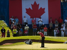 David Hearn from Brantford, Ont., putts on the 18th green during second round of play at the Canadian Open golf tournament in Oakville, Ont., on Friday, July 24, 2015. Hearn will be in the final group with Jason Day and Bubba Watson on Sunday. (THE CANADIAN PRESS/Paul Chiasson)