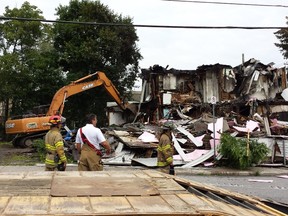 Apartment buildings in the Hull sector of Gatineau were demolished Saturday, July 25, 2015 after a fire swept through them early Saturday morning. Gatineau firefighters estimated the damage at the Lois St. buildings at more than $368,000.
COREY LAROCQUE/Ottawa Sun