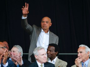 Baseball Hall of Famer Reggie Jackson is introduced during an awards ceremony at Doubleday Field Saturday, July 25, 2015, in Cooperstown, N.Y. (AP Photo/Mike Groll)