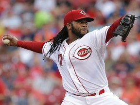 Cincinnati Reds pitcher Johnny Cueto throws during the second inning against the Detroit Tigers Wednesday, June 17, 2015, in Cincinnati. (AP Photo/John Minchillo)