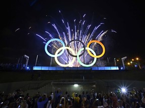 A picture of the inauguration of the first Olympic rings at Madureira Park, suburbian Rio de Janeiro, Brazil on May 20, 2015. The Olympic Games will take place in Rio in August 2016. (AFP PHOTO)