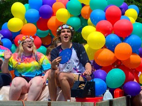 Riders on a float in the annual London Pride Parade on Sunday. (MORRIS LAMONT, The London Free Press)