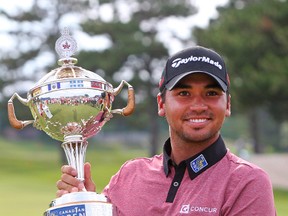 Australian Jason Day poses with the trophy as he is the winner of the RBC Canadian Open at Glen Abbey Golf Club. (Jean-Yves Ahern-USA TODAY Sports)