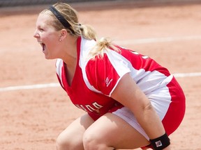 Sara Groenewegen celebrates Canada’s 4-2 win over the hated Team USA  after pitching all eight innings on Sunday. Canada took the gold medal. (The Canadian Press)