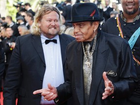 In this Friday, May 23, 2014 file photo, Joe Jackson arrives for the screening of Sils Maria at the 67th international film festival, Cannes, southern France. A Brazilian hospital says Joe Jackson — the father of the late Michael Jackson and the patriarch of the musical family — suffered a stroke while visiting the South American nation.(AP Photo/Thibault Camus, file)
