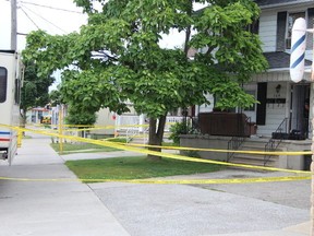 Police remained on the scene at an Ontario Street home on Saturday in Sarnia. (NEIL BOWEN, The Observer)