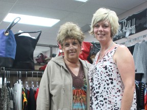 Gwen Gordey, left, and her daughter Michelle, right, pose together for a photo in their store Twice as Nice in the Lakeland Mall. The mother-daughter pair have worked together in the store for 16 years, while Gwen has owned the business for more than three decades.