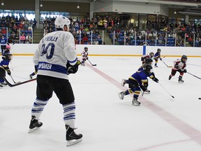 Ryan O’Reilly watches the minor hockey players.