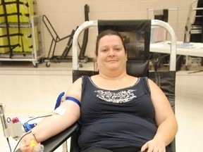 HOLLY LAWS/SPECIAL TO THE INTELLIGENCER
At a blood clinic on July 25, 2015 at the Calvary Temple in Belleville, Jessica Laws nervously gave blood for the very first time.