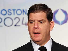 Boston Mayor Martin Walsh said he won't sign a host city contract with the USOC, which is key to the city's Olympic bid, without more assurances that taxpayers won't foot the bill. (Winslow Townson/AP/Files)