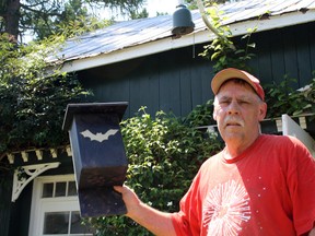SARAH HYATT/THE INTELLIGENCER
Geoff Sweet displays a bat house outside his workshop, on Highway 37. Locals are being urged to use caution after a bat in the Brighton region tested positive for rabies.