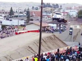 Gregg Godfrey sets a new world record after jumping a semi-truck 166 feet.