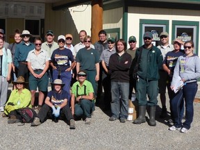 The volunteers who spent the day pulling weeds in the West Castle Wetland on July 23.