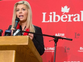 Eve Adams speaks at the Liberal nomination meeting for the Toronto riding of Eglinton-Lawrence on Sunday, July 26, 2015. THE CANADIAN PRESS/Salvatore Sacco