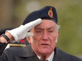 Victor Rose, a Second World War veteran who later worked for Labatt and Veterans Affairs, before becoming a longtime Legion official, has died at 95. He?s seen here on Nov. 11, 1997, at London?s Cenotaph. (Free Press file)