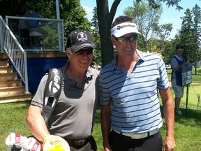 Tom Fraser, left, of Kingston was the caddie for nine holes at the Glen Abbey Golf Course in Oakville last week for professional golfer Robert Allenby during the Canadian Open. (Submitted photo)