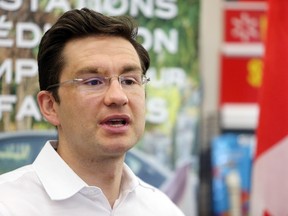 Employment Minister Pierre Poilievre in Fredericton, N.B., on Thursday, July 23, 2015. THE CANADIAN PRESS/James West