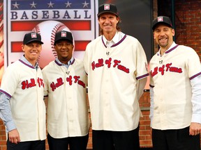 Baseball Hall of Fame’s newest members, from left, Craig Biggio, Pedro Martinez, Randy Johnson and John Smoltz put up staggering numbers in their careers. (AP)
