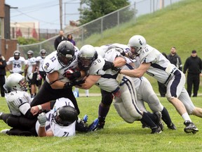 The Sudbury Spartans take on the Montreal Transit in NFC action in this 2013 file photo. Sudbury will host Montreal again Saturday to open the post-season. Ben Leeson/The Sudbury Star/Postmedia Network