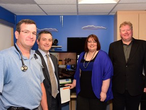 Dr. Sean Murray, a pediatrician and medical director of the family and child program at HSN, stands with Cliff Richardson, president of the HSN Volunteer Association; Keri Shewchuk, manager of the pediatric outpatient programs; and Alex Patterson, chair of the board of the HSN Foundation, on Monday to announce HSN's new acquisitions. Mary Katherine Keown/The Sudbury Star