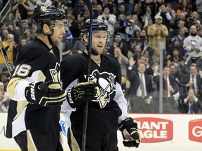 Pittsburgh Penguins centre Brandon Sutter (16) and centre Nick Spaling (right) react after Spaling's goal against the Detroit Red Wings during the second period at the CONSOL Energy Center.(Charles LeClaire-USA TODAY Sports)