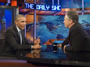 US President Barack Obama speaks with Jon Stewart, host of "The Daily Show with Jon Stewart," during a taping of the show in New York, July 21, 2015. The appearance marks Obama's third time on the show as President, and seventh overall. AFP PHOTO / SAUL LOEB