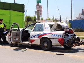 A Toronto Police cruiser was involved in a collision at Cherry and Polson Sts. on Thursday, July 28, 2015. (NICK WESTOLL/Toronto Sun)
