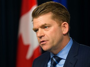 Wildrose leader Brian Jean speaks to the media during a press conference prior to the Speech from the Throne at the Alberta Legislature, in Edmonton Alta. on Monday June 15, 2015. David Bloom/Edmonton Sun