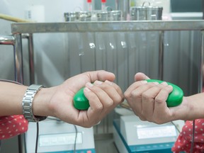 People giving blood. (File photo)