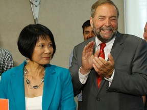 Olivia Chow is pictured Tuesday with NDP Leader Tom Mulcair. (JACK BOLAND, Toronto Sun)