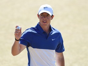 Rory McIlroy waves to the crowd after putting on the 18th green in the final round of the 2015 U.S. Open golf tournament at Chambers Bay. Kyle Terada-USA TODAY Sports