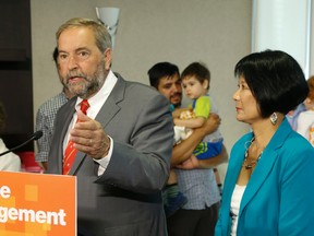 NDP federal leader Tom Mulcair said Toronto is "Canada's most important city" while alongside Olivia Chow in Toronto on Tuesday. (Jack Boland/Postmedia Network)