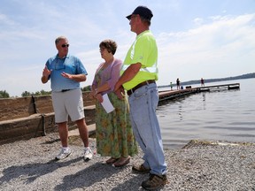 Emily Mountney-Lessard/The Intelligencer
Prince Edward-Hastings MP Daryl Kramp, Tweed Mayor Jo-Anne Albert and municipal parks and recreation employee Randy Lucas at the boat launch, on Wednesday, in Tweed.