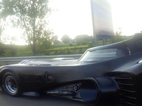The Batmobile is photographed along Hwy. 401 near Napanee on Sunday after it broke down following an appearance in Kingston. Photo courtesy of Jeff Rathburn (@homrbush)