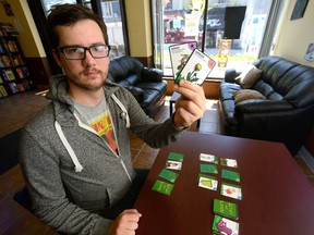 Card game designer Andrew Brown has designed a game based on things suburbanites yell about staying off their lawns. (MORRIS LAMONT, The London Free Press)