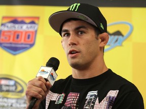 Ultimate Fighting Championship Bantamweight fighter Dominick Cruz speaks to the media prior to the NASCAR Sprint Cup Series AdvoCare 500 at Phoenix International Raceway on November 11, 2012. (Todd Warshaw/Getty Images for NASCAR/AFP)