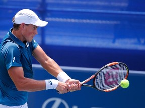 Vasek Pospisil returns a backhand to Yen-Hsun Lu during the BB&T Atlanta Open at Atlantic Station on July 29, 2015 in Atlanta. (Kevin C. Cox/Getty Images/AFP)