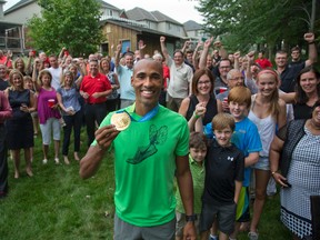 Pan American Games decathlon gold medallist Damian Warner was feted by friends and supporters at the home of Jeffery Fischer in London. (DEREK RUTTAN, The London Free Press)