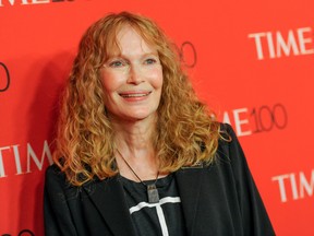 In this April 21, 2015 file photo, Mia Farrow attends the TIME 100 Gala in New York. Farrow took some Twitter heat Wednesday, July 29, for joining other angry social media posters and blasting out the business address of the dentist who killed the beloved lion Cecil in Zimbabwe. (Photo by Evan Agostini/Invision/AP, File)