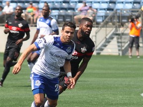 FC Edmonton defender Michael Nonni chases after a loose ball during NASL action in Fort McMurray Alta. on Sunday July 5, 2015. Robert Murray/Fort McMurray Today/Postmedia Network