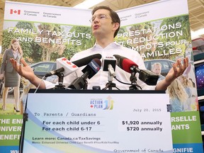 Employment Minister Pierre Poilievre talks about the increased payments to families as part of the Universal Child Care Benefit during a press conference in Fredericton, N.B., on Thursday, July 23, 2015. THE CANADIAN PRESS/James West