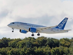 Bombardier's CSeries aircraft takes offon its first test flight in Mirabel, Quebec, in this file photo taken September 16, 2013. (REUTERS/Christinne Muschi/Files)
