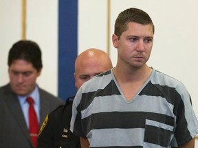 Former University of Cincinnati police officer Ray Tensing appears at Hamilton County Courthouse for his arraignment in the shooting death of motorist Samuel DuBose, on July 30, 2015, in Cincinnati. (AP Photo/John Minchillo)