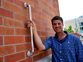 Michael Finch, owner of Those Grab Bar Guys, in downtown London Ont. July 22, 2015. CHRIS MONTANINI\LONDONER\POSTMEDIA NETWORK