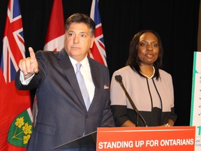 Ontario Finance Minister Charles Sousa and Associate Finance Minister Mitzie Hunter accuse the Stephen Harper government of playing politics by blocking CPP participation in the provincial pension proposal July 30, 2105. (ANTONELLA ARTUSO/Toronto Sun)