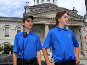 Kingston Youth Police Initiatives summer students Wliiam Arsenault, left,  and Trevor Kirby in front of City Hall on  Ontario Street in Kingston on Wednesday July 29. Ian MacAlpine/The Kingston Whig-Standard/Postmedia Network
