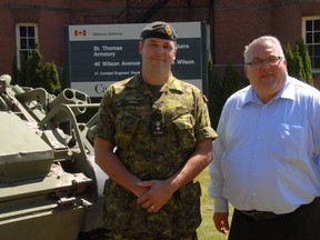 Commanding officer of the 31 Combat Engineer Regiment Lt.-Col. Scott Smith, left, and Elgin-Middlesex-London MP Joe Preston stand outside the St. Thomas Armoury Thursday. The facility is slated for $1.2 million in repairs through the Department of National Defence infrastructure funding plan.