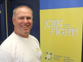 Doug Kane is the manager of the Canadian Cancer Society's Frontenac, Lennox and Addington community office in Kingston, Ont. on Thurs., July 30, 2015. The society is again holding its Fearless Challenge, where people can raise money for cancer research by confronting their worst fears. Michael Lea/The Whig-Standard/Postmedia Network